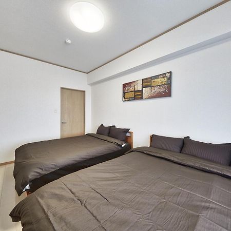 Freedomhillsフリーダムヒルズa棟 Apartment Tomigusuku Bagian luar foto