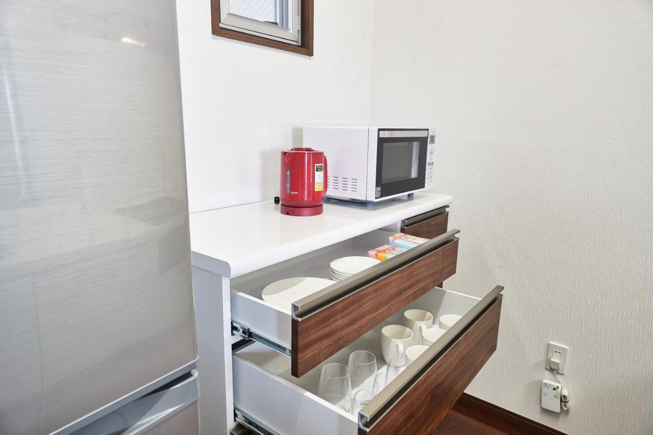 Freedomhillsフリーダムヒルズa棟 Apartment Tomigusuku Bagian luar foto